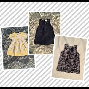 A bundle of three girl dresses size 3T.